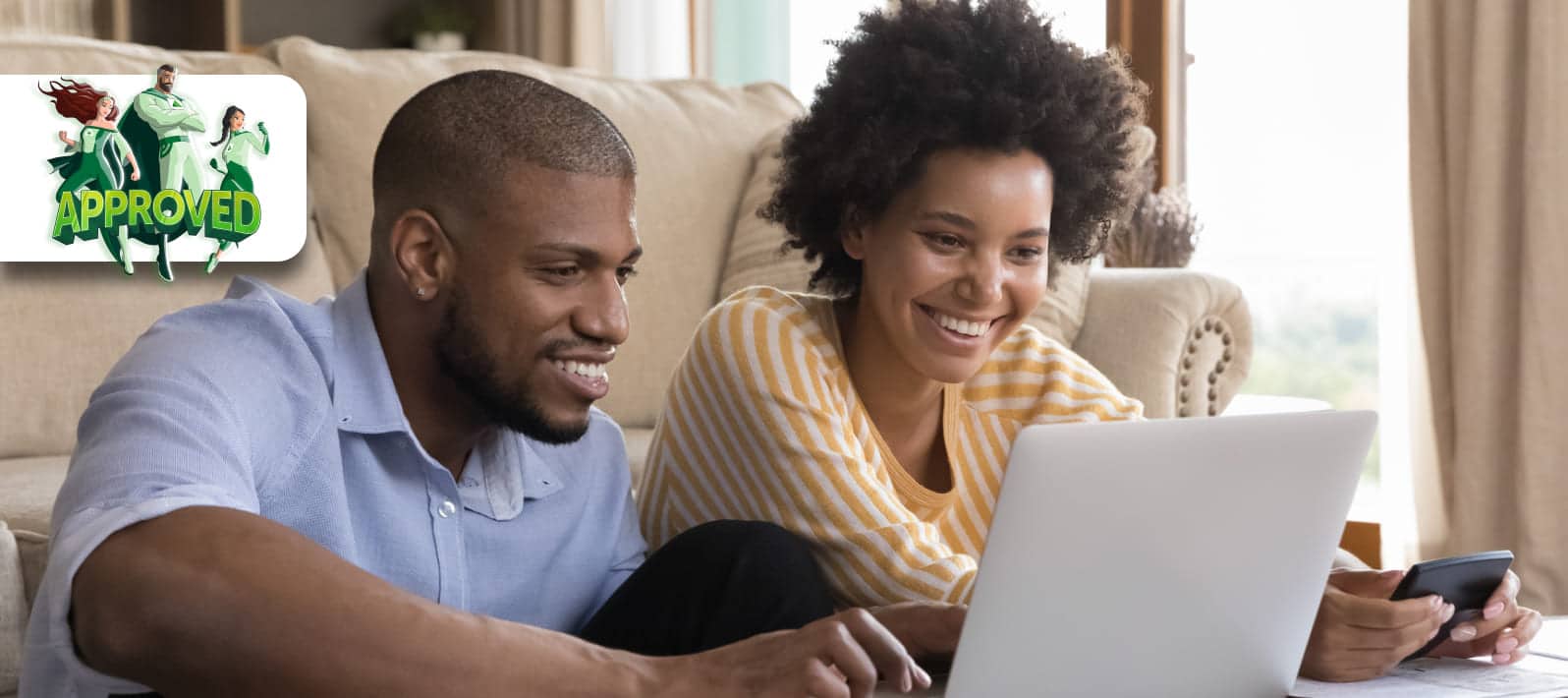 a man and woman looking at a laptop looking at secured personal loan
